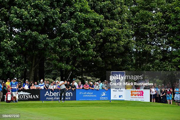 Alex Noren of Sweden takes his tee shot on hole 8 on day three of the Aberdeen Asset Management Paul Lawrie Matchplay at Archerfield Links Golf Club...