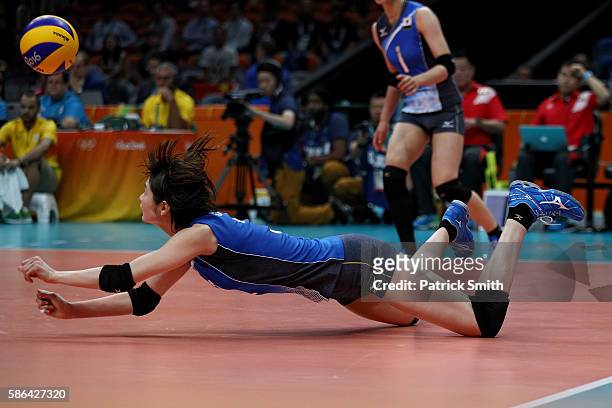 Saori Kimura of Japan plays a shot against Korea during the Women's Preliminary Pool A match between Japan and Korea on Day 1 of the Rio de Janeiro...