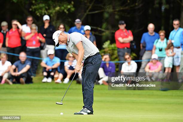 Alex Noren of Sweden takes a putt on hole 11 on day three of the Aberdeen Asset Management Paul Lawrie Matchplay at Archerfield Links Golf Club on...