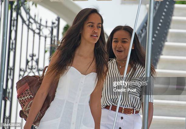 Malia and Sasha Obama depart ahead of their parents United States President Barack Obama and first lady Michelle Obama depart the White House August...