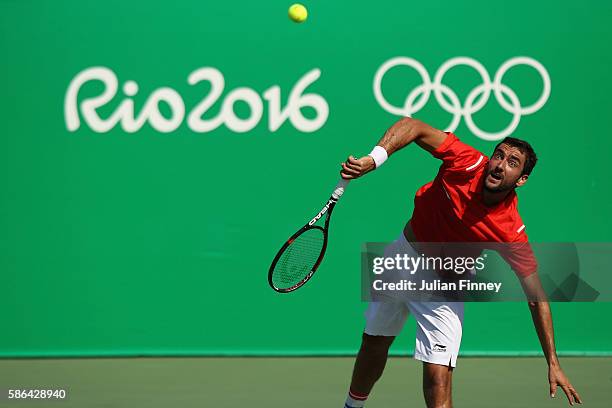 Marin Cilic of Croatia in action against Grigor Dimitrov of Bulgaria in the men's first round on Day 1 of the Rio 2016 Olympic Games at the Olympic...