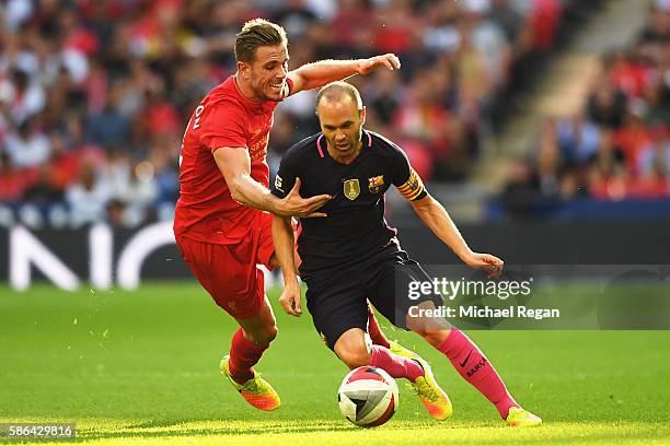 Andres Iniesta of Barcelona goes past Jordan Henderson of Liverpool during the International Champions Cup match between Liverpool and Barcelona at...