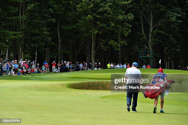 Anthony Wall of England walks to the green on hole 6 on day three of the Aberdeen Asset Management Paul Lawrie Matchplay at Archerfield Links Golf...