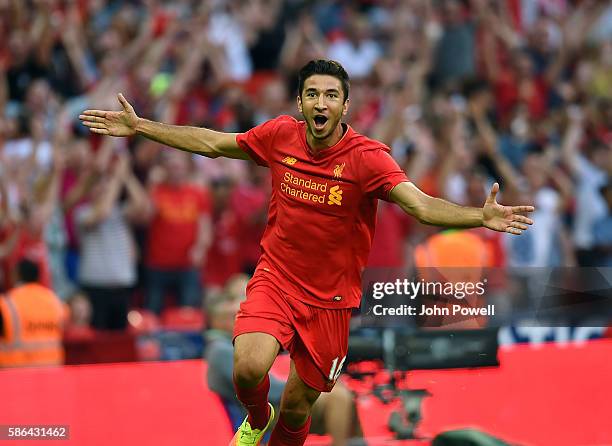 Marko Grujic of Liverpool celebrates after scoring the fourth goal during the International Champions Cup match between Liverpool and Barcelona at...