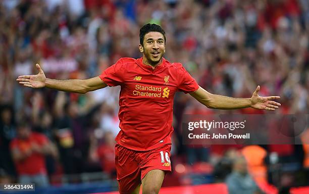 Marko Grujic of Liverpool celebrates after scoring the fourth goal during the International Champions Cup match between Liverpool and Barcelona at...