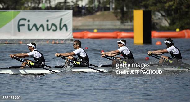 New Zealand's Jade Uru, New Zealand's George Bridgewater, New Zealand's John Storey and New Zealand's Nathan Flannery row during the Men's Quadruple...