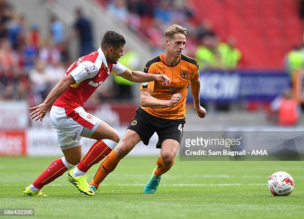 Dave Edwards of Wolverhampton Wanderers and Jake Forster-Caskey of Rotherham United during the Sky Bet Championship match between Rotherham United v...