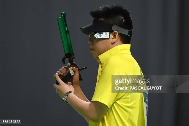 China's Pang Wei competes in the men's 10m air pistol shooting final at the Rio 2016 Olympic Games at the Olympic Shooting Centre in Rio de Janeiro...
