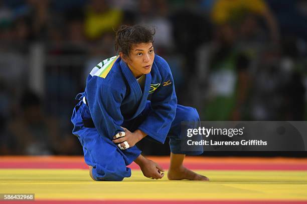 Sarah Menezes of Brazil reacts after being defeated by Urantsetseg Munkhbat of Mongolia during the women's -48kg judo contest on Day 1 of the Rio...