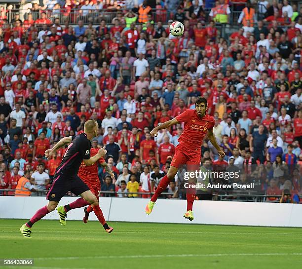 Marko Grujic of Liverpool scoring the fourth goal during the International Champions Cup match between Liverpool and Barcelona at Wembley Stadium on...