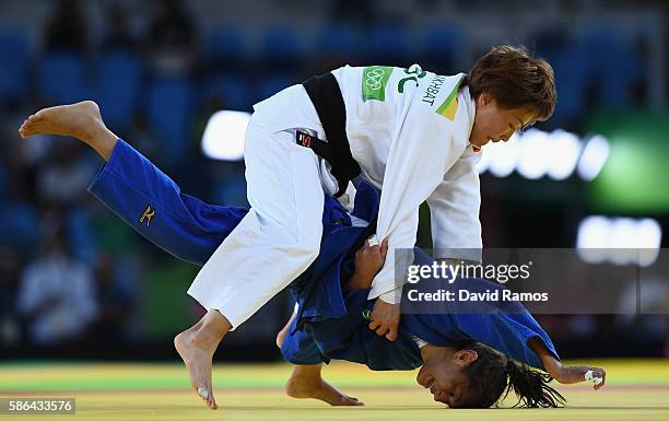 Sarah Menezes of Brazil competes against Urantsetseg Munkhbat of Mongolia during the Women's -48 kg Repechage Judo contest on Day 1 of the Rio 2016...