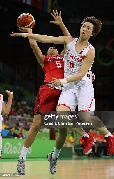 Kia Nurse of Canada attempts a shot against Di Wu of China during a Women's Basketball Preliminary Round game on Day 1 of the Rio 2016 Olympic Games...