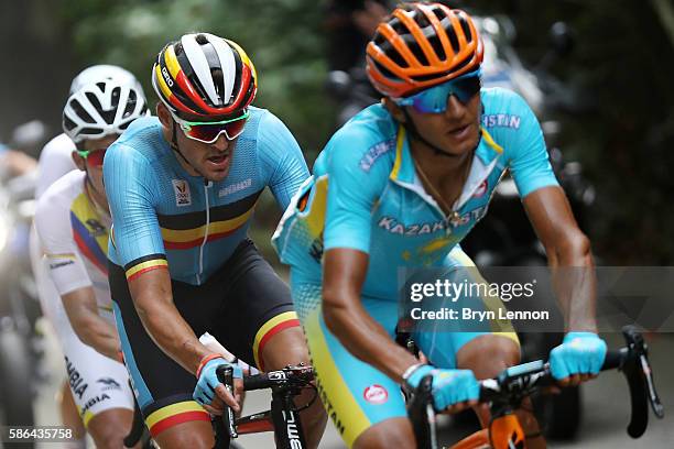Greg van Avermaet of Belgium and Andrey Zeits of Kazakhstan compete during the Men's Road Race on Day 1 of the Rio 2016 Olympic Games at the Fort...