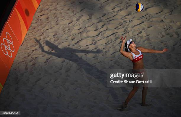 Barbora Hermannova of the Czech Republic of the Czech Republic serves during the Women's Beach Volleyball preliminary round Pool B match against...