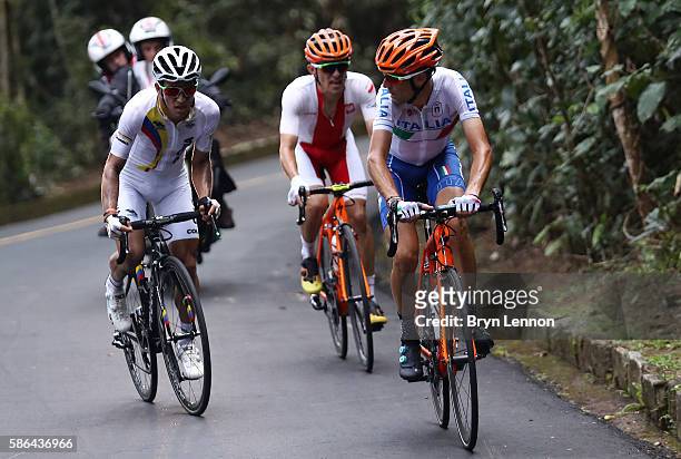 Sergio Luis Henao Montoya of Colombia and Vincenzo Nibali of Italy compete before their crash during the Men's Road Race on Day 1 of the Rio 2016...