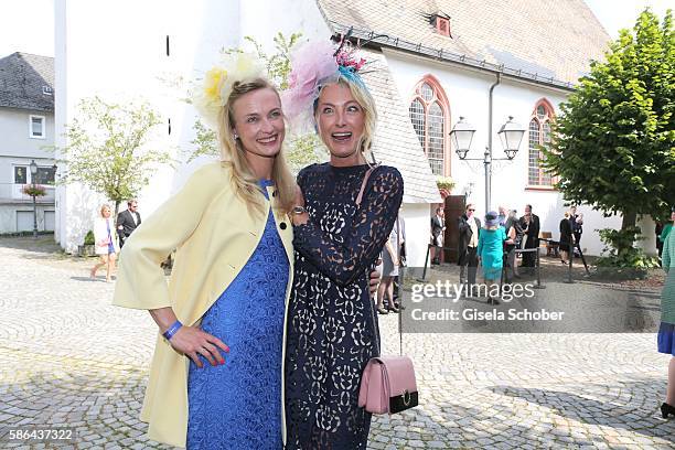 Princess Vanessa zu Sayn-Wittgenstein and her sister Prinzessin Lilly zu Sayn-Wittgenstein-Berleburg make fun during the wedding of Prince Maximilian...