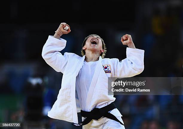 Bokyeong Jeong of Korea celebrates after defeating Dayaris Mestre Alvarez of Cuba during the Women's -48 kg Semifinal of Table A Judo contest on Day...