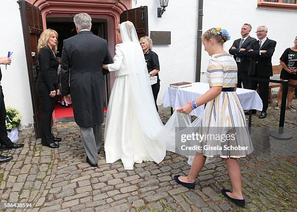 Bride Franziska Prinzessin zu Sayn-Wittgenstein-Berleburg, born Balzer and her father Thomas Balzer, Lana Milona during the wedding of Prince...