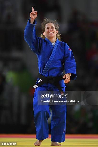 Paula Pareto of Argentina celebrates after defeating Bokyeong Jeong of Korea in the Women's -48 kg Gold Medal contest on Day 1 of the Rio 2016...