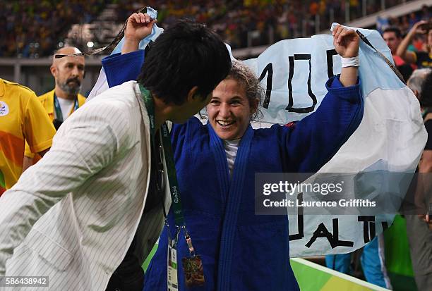 Paula Pareto of Argentina celebrates after defeating Bokyeong Jeong of Korea in the Women's -48 kg Gold Medal contest on Day 1 of the Rio 2016...