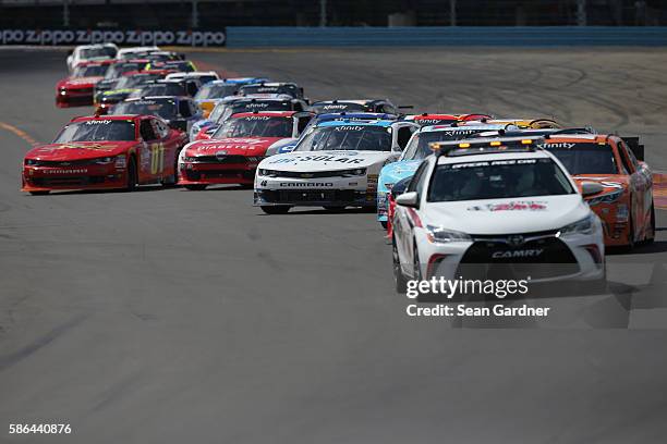 Cars are parked on the track during a red flag after an on-track incident during the NASCAR XFINITY Series Zippo 200 at Watkins Glen International on...