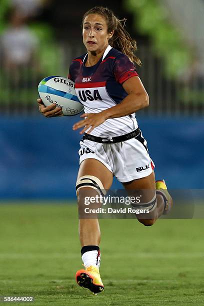 Ryan Carlyle of the United States runs with the ball during a Women's Pool A rugby match between the United States and Colombia on Day 1 of the Rio...