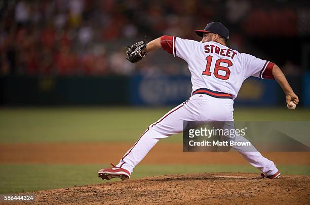 Closing pitcher Huston Street of the Los Angeles Angels of Anaheim pitches during the ninth inning of the game against the Texas Rangers at Angel...