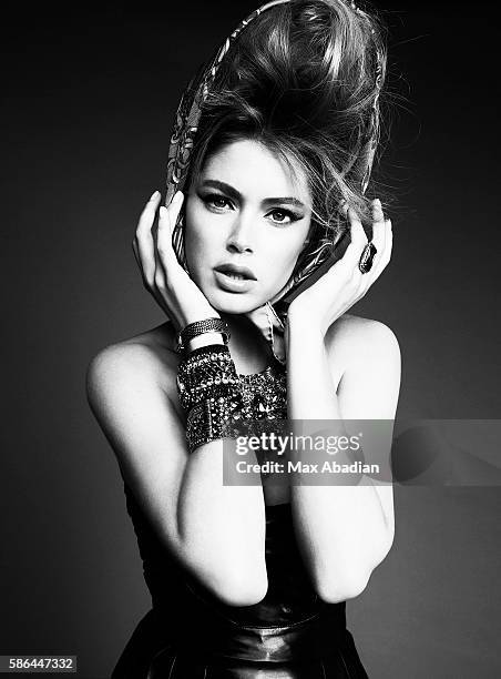 Elizabeth Cabral; Hair: Frankie Foye; Makeup: Susan Houser. Leather dress by Dior. Scarf by Gucci. Necklace by Rita Tesolin. Bracelets by Aldo...