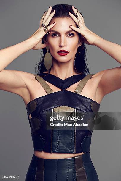 Juliana Schiavinatto; Hair: Marcus Francis; Makeup: Jo Baker; Manicure: Tom Bachik. Leather top and skirt by Roland Mouret. Gold-plated earrings by...