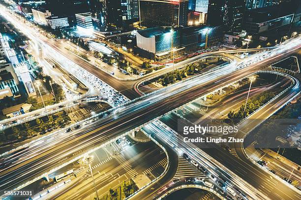 city traffic night - linghe zhao stock pictures, royalty-free photos & images