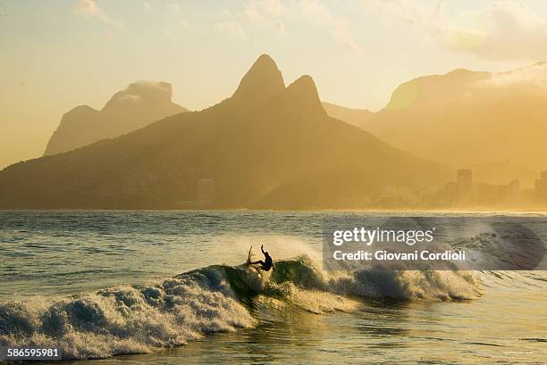 surf at ipanema - ipanema beach stock-fotos und bilder