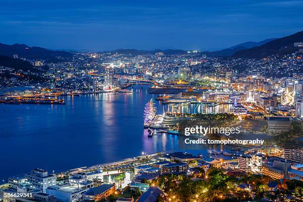 night shot of nagasaki city - nagasaki stock-fotos und bilder