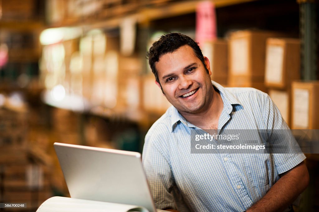 Hispanic Manager in Warehouse