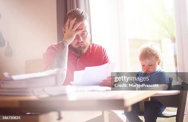 struggling with debt - emotional stress family stock pictures, royalty-free photos & images