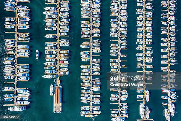 elliot bay marina aerial view - seattle washington - moored stock pictures, royalty-free photos & images