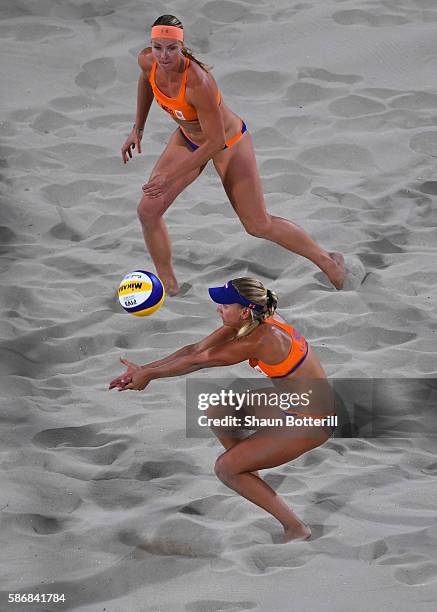 Marleen van Iersel and Madelein Meppelink of the Netherlands in action during the Women's Beach Volleyball preliminary round Pool F match against...