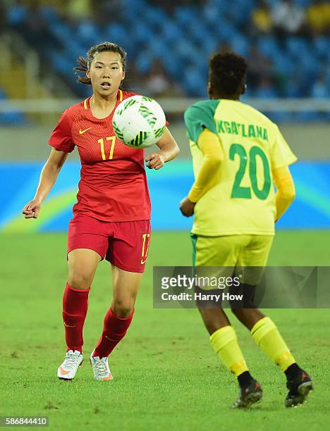 Yasha Gu of China looks to control the ball during the Women's Group E first round match between South Africa and China PR on Day 1 of the Rio 2016...