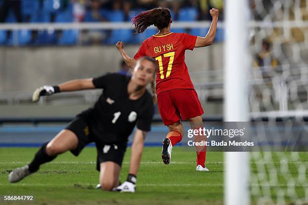 Yasha Gu of China celebrates after scoring China's first goal past Roxanne Barker of South Africa during the Women's Group E first round match...