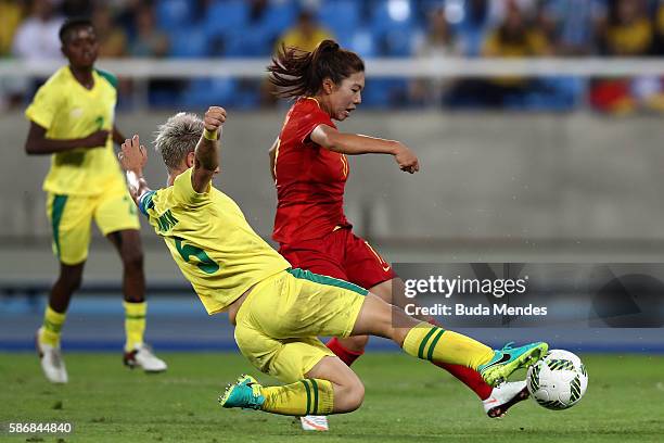 Yasha Gu of China scores China's first goal past Janine van Wyk of South Africa during the Women's Group E first round match between South Africa and...