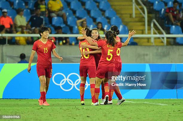 Yasha Gu of China celebrates her goal during the Women's Group E first round match between South Africa and China PR on Day 1 of the Rio 2016 Olympic...