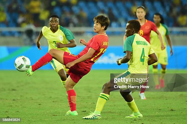 Shuang Wang of China controls the ball during the Women's Group E first round match between South Africa and China PR on Day 1 of the Rio 2016...