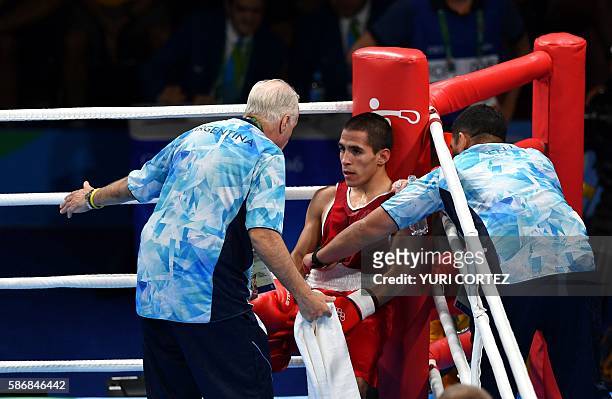 Argentina's Leandro Blanc prepares to fight against Mexico's Joselito Velazquez during the Men's Light Fly match at the Rio 2016 Olympic Games at the...