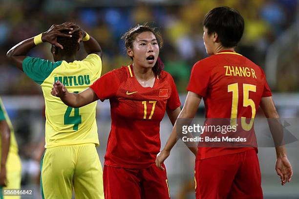 Yasha Gu of China, Rui Zhang of China and Noko Matlou of South Africa react during the Women's Group E first round match between South Africa and...