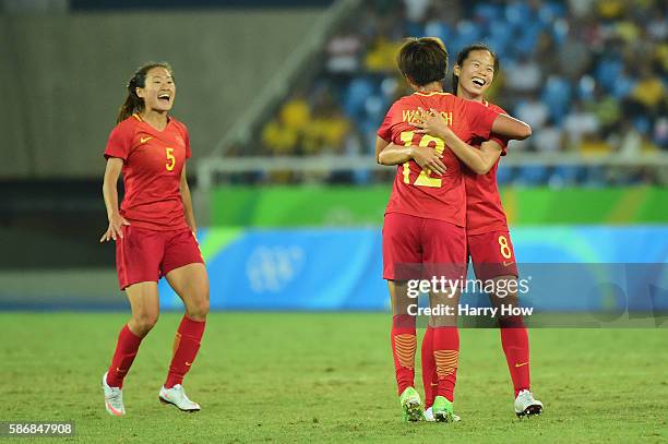 Ruyin Tan of China celebrates her goal during the Women's Group E first round match between South Africa and China PR on Day 1 of the Rio 2016...