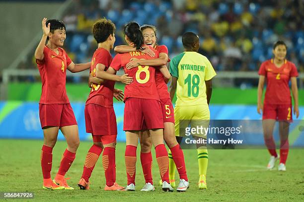 Ruyin Tan of China celebrates her goal with her teammates during the Women's Group E first round match between South Africa and China PR on Day 1 of...