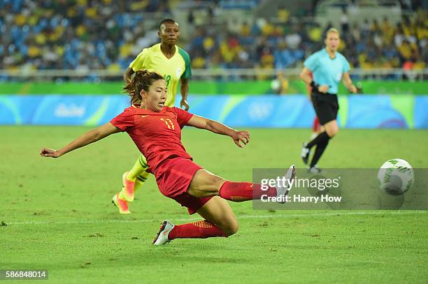 Yasha Gu of China shoots at goal during the Women's Group E first round match between South Africa and China PR on Day 1 of the Rio 2016 Olympic...