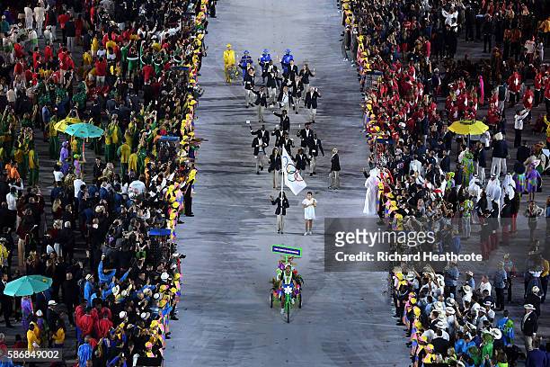 The Olympic Refugee team enter the atheletes parade during the Opening Ceremony of the Rio 2016 Olympic Games at Maracana Stadium on August 5, 2016...