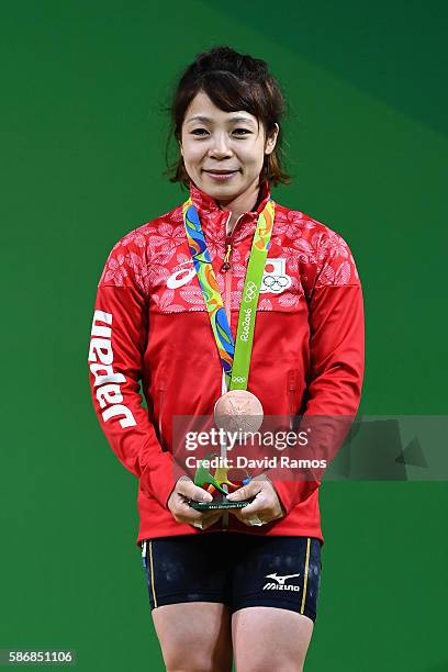 Hiromi Miyake of Japan celebrates after winning the Bronze medal in the Women's 48kg Group A Final on Day 1 of the Rio 2016 Olympic Games at...