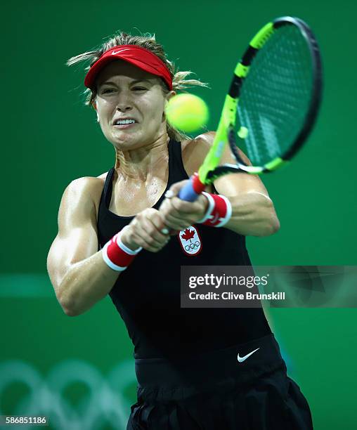 Eugenie Bouchard of Canada plays a backhand against Sloane Stephens of the United States in their first round match on Day 1 of the Rio 2016 Olympic...