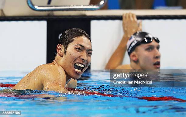 Kosuke Hagino of Japan celebrates after he wins the final of the Men's 400m IM on Day 1 of the Rio 2016 Olympic Games at the Olympic Aquatics Stadium...